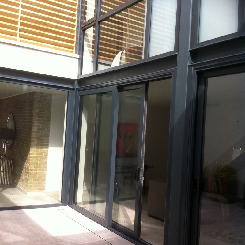 Anthracite aluminium sliding patio doors fitted in Poplar