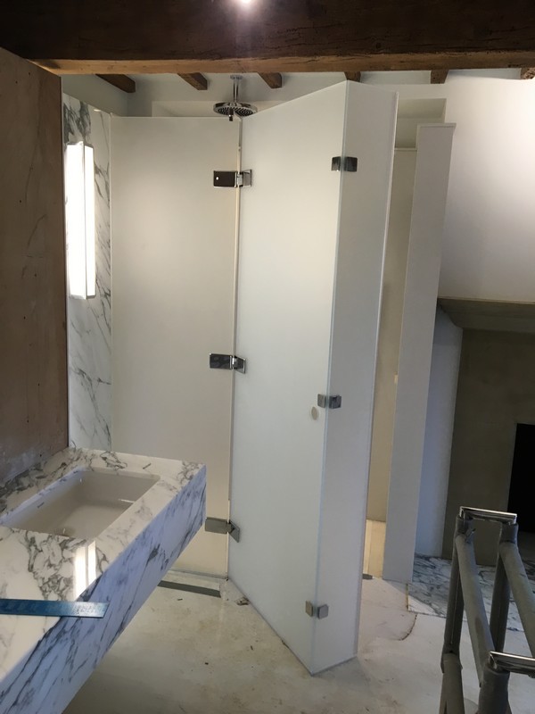 Bespoke frosted glass shower enclosure in Poplar luxury bathroom