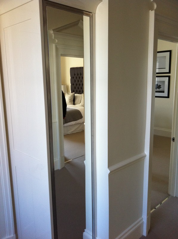Full-length wardrobe mirror fitted in Poplar home